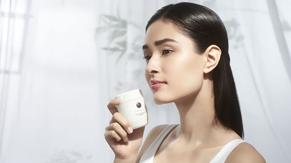 Model posing with The Rice Polish: Classic