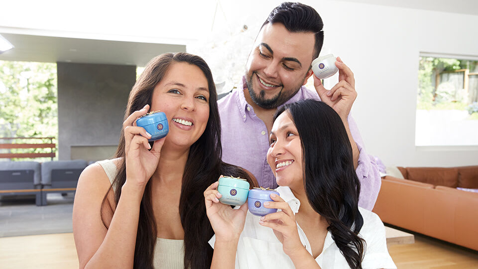 Tatcha Family Employee group shot with The Calming Cream, The Water Cream, The Dewy Skin Cream and The Silk Cream