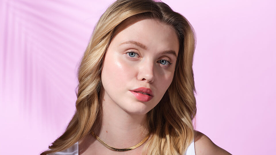 Model wearing The Kissu Lip Tint SPF 25