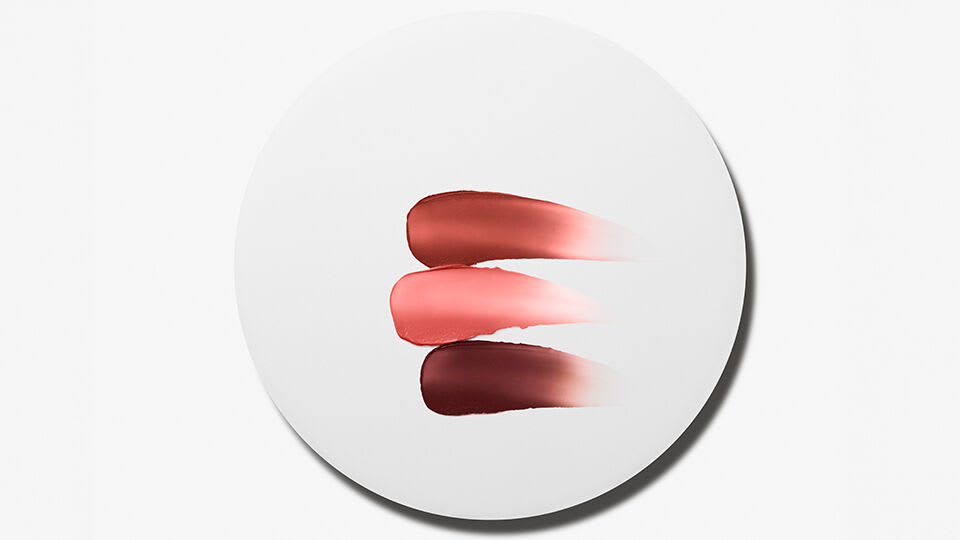 Kissu Lip Tint Swatches in Plum Blossom, Camellia, and Midnight Lily.