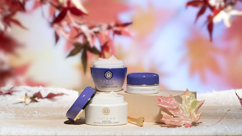 Ageless Enriching Renewal Cream, Ageless Revitalizing Neck Cream and Ageless Revitalizing Eye Cream placed on a fall setting.