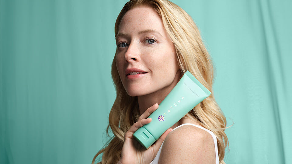 Model posing with The Matcha Cleanse