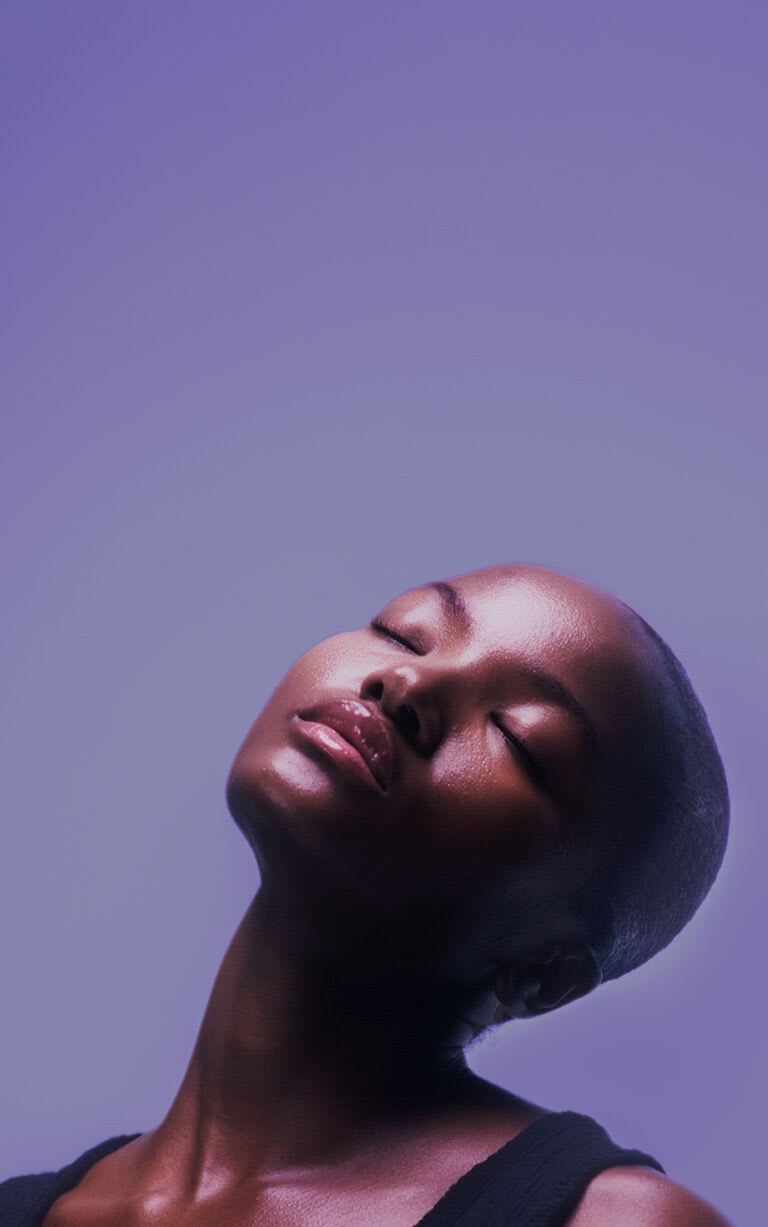 Woman closing her eyes leaning back