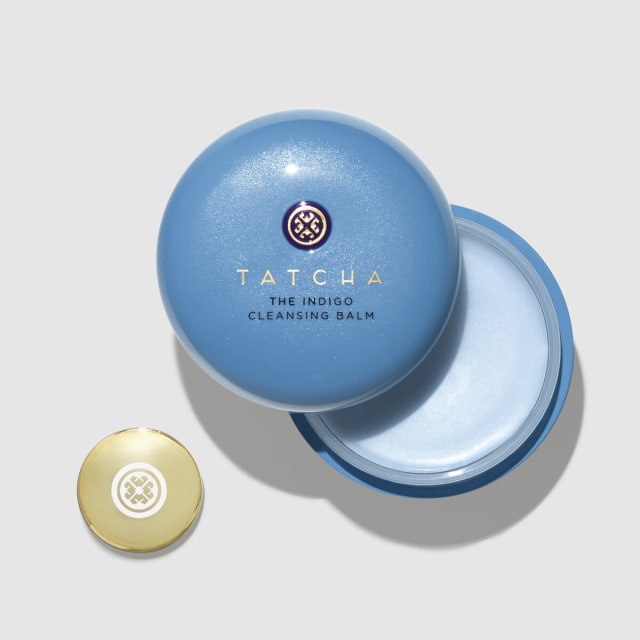 Open package of Indigo Cleansing Balm with coin applicator