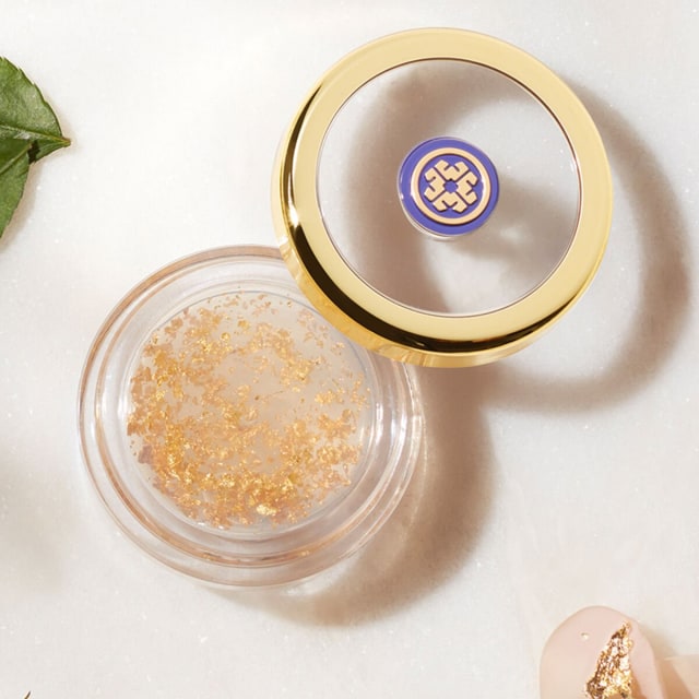 Shot of Camellia Gold Spun Lip Balm.