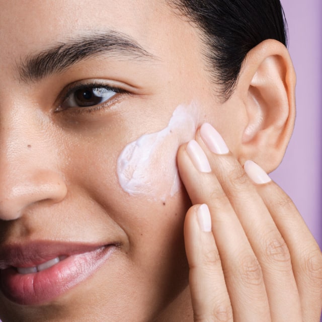 The Dewy Skin Cream being applied to skin
