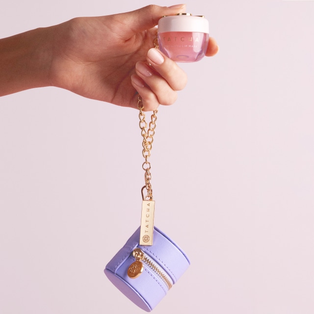 Woman applying lip product