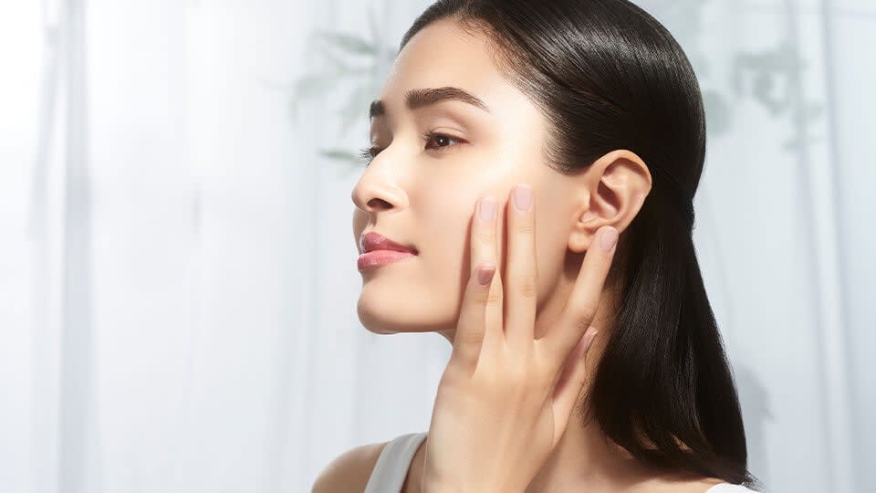 Model Applying Moisturizer